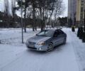 Серый Киа Черато, объемом двигателя 1.6 л и пробегом 180 тыс. км за 4500 $, фото 1 на Automoto.ua