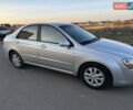 Серый Киа Черато, объемом двигателя 1.6 л и пробегом 168 тыс. км за 5500 $, фото 3 на Automoto.ua
