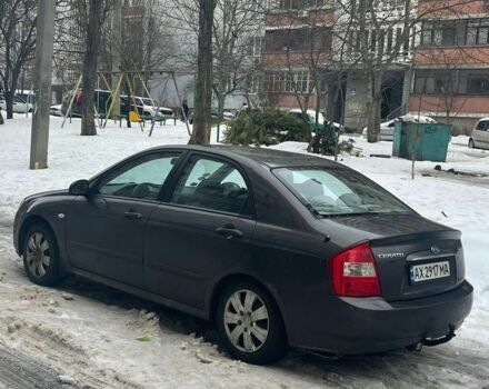 Сірий Кіа Черато, об'ємом двигуна 1.6 л та пробігом 233 тис. км за 2800 $, фото 8 на Automoto.ua