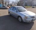 Сірий Кіа Черато, об'ємом двигуна 1.6 л та пробігом 169 тис. км за 4600 $, фото 1 на Automoto.ua