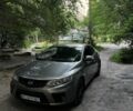Серый Киа Черато, объемом двигателя 2 л и пробегом 190 тыс. км за 6950 $, фото 1 на Automoto.ua
