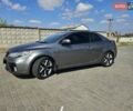 Серый Киа Черато, объемом двигателя 2 л и пробегом 100 тыс. км за 9000 $, фото 1 на Automoto.ua