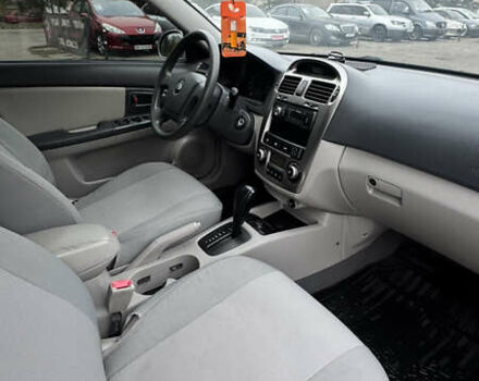 Серый Киа Черато, объемом двигателя 1.98 л и пробегом 166 тыс. км за 4099 $, фото 25 на Automoto.ua