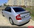 Серый Киа Черато, объемом двигателя 1.6 л и пробегом 350 тыс. км за 4100 $, фото 3 на Automoto.ua