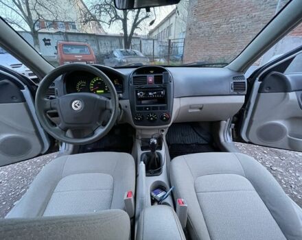 Серый Киа Черато, объемом двигателя 1.5 л и пробегом 204 тыс. км за 3700 $, фото 11 на Automoto.ua