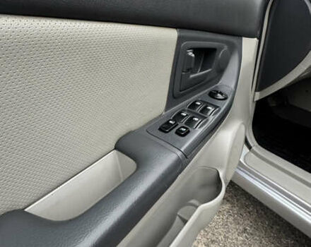 Серый Киа Черато, объемом двигателя 1.98 л и пробегом 166 тыс. км за 4099 $, фото 18 на Automoto.ua