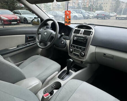 Серый Киа Черато, объемом двигателя 1.98 л и пробегом 166 тыс. км за 4099 $, фото 24 на Automoto.ua