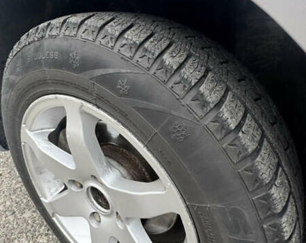 Серый Киа Черато, объемом двигателя 1.98 л и пробегом 166 тыс. км за 4099 $, фото 16 на Automoto.ua