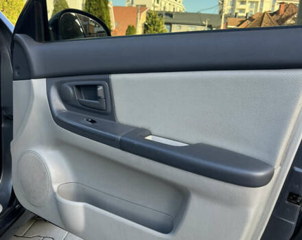 Серый Киа Черато, объемом двигателя 1.98 л и пробегом 275 тыс. км за 4300 $, фото 17 на Automoto.ua