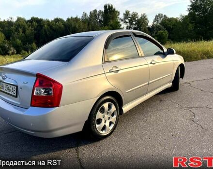 Серый Киа Черато, объемом двигателя 2 л и пробегом 105 тыс. км за 5350 $, фото 3 на Automoto.ua