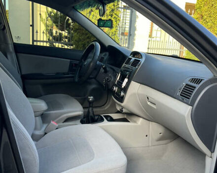 Серый Киа Черато, объемом двигателя 1.98 л и пробегом 275 тыс. км за 4300 $, фото 14 на Automoto.ua