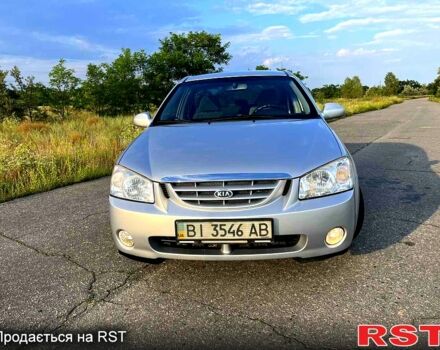 Серый Киа Черато, объемом двигателя 2 л и пробегом 105 тыс. км за 5350 $, фото 2 на Automoto.ua