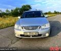 Серый Киа Черато, объемом двигателя 2 л и пробегом 105 тыс. км за 5350 $, фото 2 на Automoto.ua