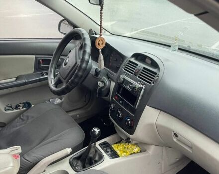 Серый Киа Черато, объемом двигателя 1.6 л и пробегом 315 тыс. км за 3650 $, фото 4 на Automoto.ua