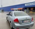 Серый Киа Черато, объемом двигателя 1.6 л и пробегом 315 тыс. км за 3650 $, фото 2 на Automoto.ua