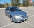 Серый Киа Черато, объемом двигателя 1.6 л и пробегом 297 тыс. км за 3800 $, фото 1 на Automoto.ua