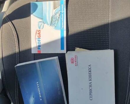 Серый Киа Черато, объемом двигателя 1.98 л и пробегом 255 тыс. км за 4300 $, фото 37 на Automoto.ua