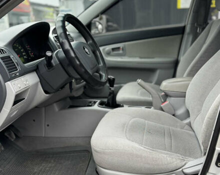 Серый Киа Черато, объемом двигателя 2 л и пробегом 240 тыс. км за 4300 $, фото 9 на Automoto.ua