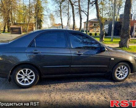 Серый Киа Черато, объемом двигателя 1.6 л и пробегом 255 тыс. км за 4000 $, фото 1 на Automoto.ua