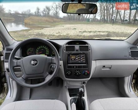 Сірий Кіа Черато, об'ємом двигуна 1.6 л та пробігом 45 тис. км за 6999 $, фото 8 на Automoto.ua