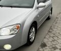 Серый Киа Черато, объемом двигателя 2 л и пробегом 240 тыс. км за 4300 $, фото 3 на Automoto.ua