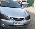 Сірий Кіа Черато, об'ємом двигуна 2 л та пробігом 260 тис. км за 3000 $, фото 1 на Automoto.ua