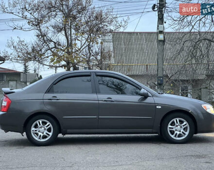 Серый Киа Черато, объемом двигателя 1.98 л и пробегом 213 тыс. км за 4900 $, фото 3 на Automoto.ua