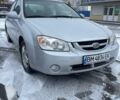 Сірий Кіа Черато, об'ємом двигуна 1.6 л та пробігом 306 тис. км за 3600 $, фото 1 на Automoto.ua