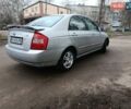 Серый Киа Черато, объемом двигателя 2 л и пробегом 198 тыс. км за 4200 $, фото 3 на Automoto.ua