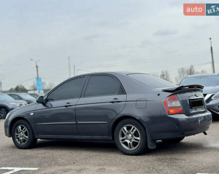 Сірий Кіа Черато, об'ємом двигуна 1.6 л та пробігом 290 тис. км за 3800 $, фото 6 на Automoto.ua