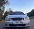 Серый Киа Черато, объемом двигателя 2 л и пробегом 350 тыс. км за 4300 $, фото 3 на Automoto.ua