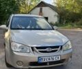 Сірий Кіа Черато, об'ємом двигуна 1.6 л та пробігом 200 тис. км за 3750 $, фото 1 на Automoto.ua