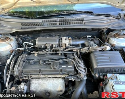 Серый Киа Черато, объемом двигателя 1.6 л и пробегом 235 тыс. км за 3700 $, фото 11 на Automoto.ua