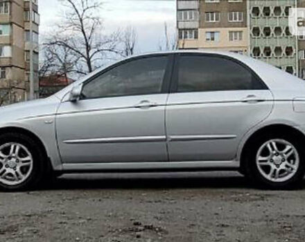 Сірий Кіа Черато, об'ємом двигуна 2 л та пробігом 296 тис. км за 4900 $, фото 11 на Automoto.ua