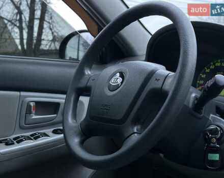 Серый Киа Черато, объемом двигателя 1.98 л и пробегом 213 тыс. км за 4900 $, фото 28 на Automoto.ua