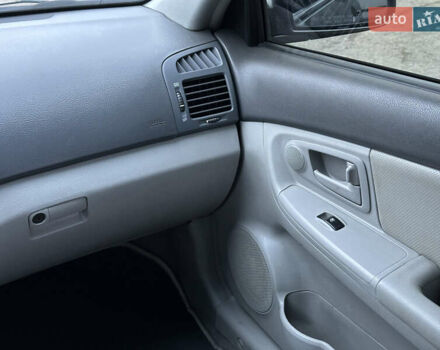 Серый Киа Черато, объемом двигателя 1.98 л и пробегом 213 тыс. км за 4900 $, фото 22 на Automoto.ua