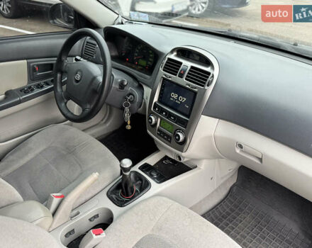 Сірий Кіа Черато, об'ємом двигуна 1.6 л та пробігом 290 тис. км за 3800 $, фото 12 на Automoto.ua