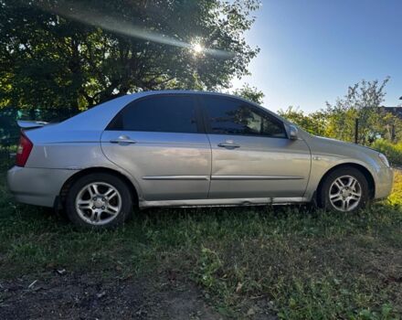 Серый Киа Черато, объемом двигателя 1.6 л и пробегом 250 тыс. км за 2700 $, фото 2 на Automoto.ua