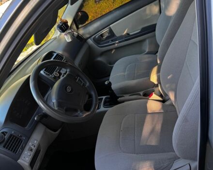 Серый Киа Черато, объемом двигателя 1.6 л и пробегом 250 тыс. км за 2700 $, фото 4 на Automoto.ua