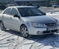 Серый Киа Черато, объемом двигателя 1.6 л и пробегом 240 тыс. км за 3300 $, фото 1 на Automoto.ua