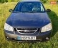 Сірий Кіа Черато, об'ємом двигуна 1.6 л та пробігом 242 тис. км за 4000 $, фото 1 на Automoto.ua