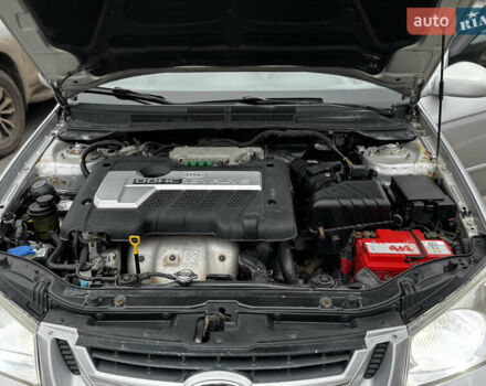 Серый Киа Черато, объемом двигателя 2 л и пробегом 240 тыс. км за 4300 $, фото 14 на Automoto.ua