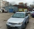 Серый Киа Черато, объемом двигателя 2 л и пробегом 300 тыс. км за 3100 $, фото 1 на Automoto.ua