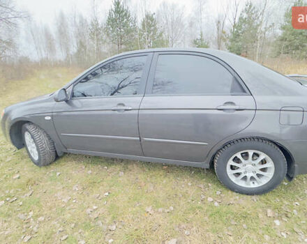 Серый Киа Черато, объемом двигателя 2 л и пробегом 180 тыс. км за 3800 $, фото 9 на Automoto.ua