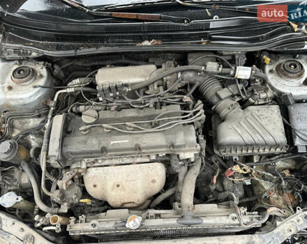 Сірий Кіа Черато, об'ємом двигуна 2 л та пробігом 280 тис. км за 2300 $, фото 4 на Automoto.ua