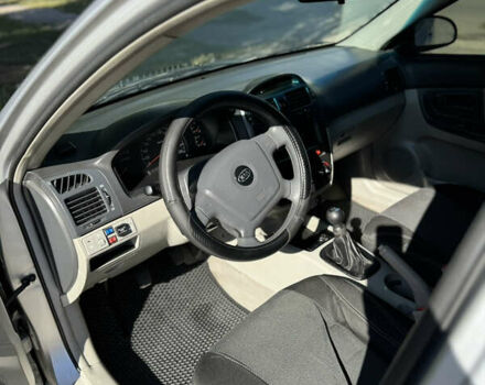 Сірий Кіа Черато, об'ємом двигуна 1.6 л та пробігом 287 тис. км за 3900 $, фото 4 на Automoto.ua