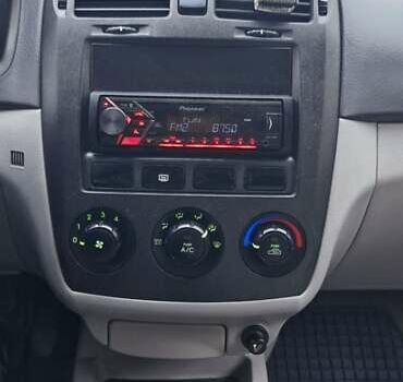 Сірий Кіа Черато, об'ємом двигуна 1.6 л та пробігом 259 тис. км за 4000 $, фото 10 на Automoto.ua