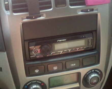 Серый Киа Черато, объемом двигателя 2 л и пробегом 255 тыс. км за 4700 $, фото 8 на Automoto.ua