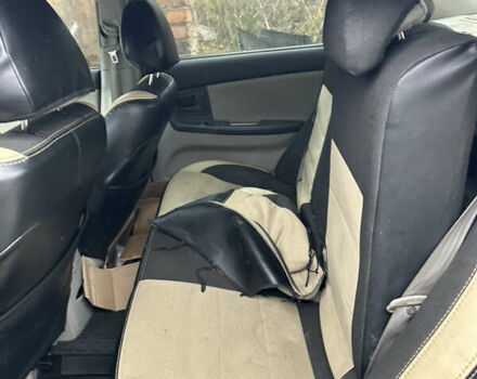 Сірий Кіа Черато, об'ємом двигуна 2 л та пробігом 280 тис. км за 2100 $, фото 16 на Automoto.ua