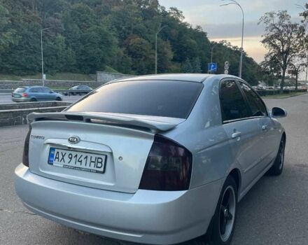 Сірий Кіа Черато, об'ємом двигуна 2 л та пробігом 350 тис. км за 4100 $, фото 3 на Automoto.ua
